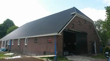 Renovatie van een boerderij dak te Vledderveen