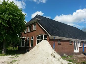 Renovatie van een boerderij dak te Vledderveen